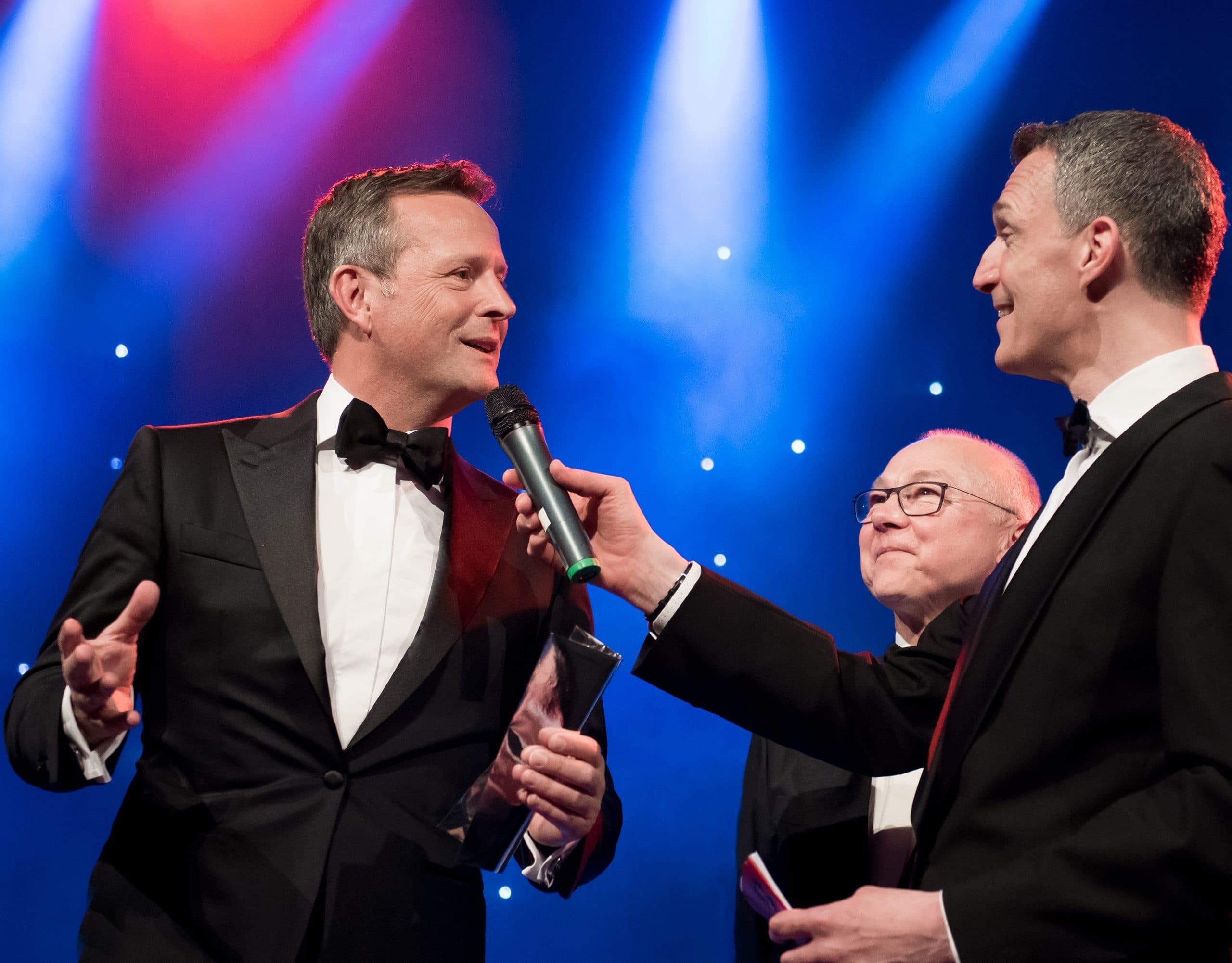Presenter hosting an awards ceremony